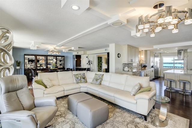 1581 Gulf Blvd Unit 701N, Clearwater Beach, FL 33767 - living area featuring a chandelier, dark wood-type flooring, beamed ceiling, ceiling fan, and recessed lighting