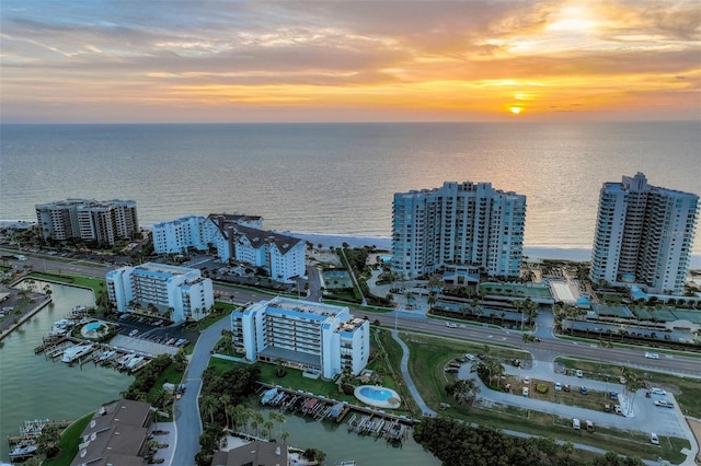 1581 Gulf Blvd Unit 701N, Clearwater Beach, FL 33767 - aerial view at dusk of a water view, a city view, and view of marina