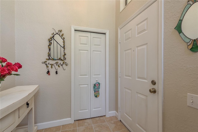 247 Los Prados Dr Unit 1123, Safety Harbor, FL 34695 - foyer entrance featuring light tile patterned floors and baseboards