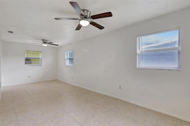 1903 24th St, Sarasota, FL 34234 - unfurnished room featuring a textured ceiling and ceiling fan
