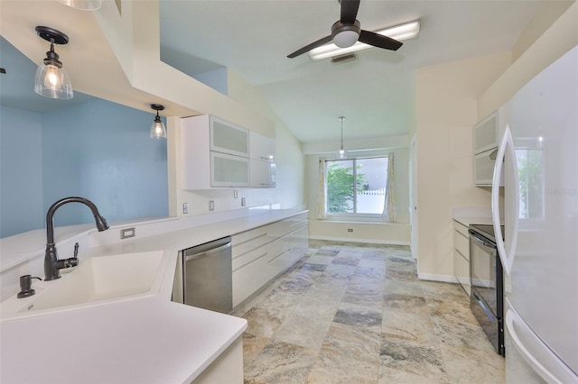 10430 Crestfield Dr, Riverview, FL 33569 - kitchen with stainless steel dishwasher, freestanding refrigerator, black electric range oven, white cabinets, and light countertops