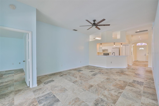 10430 Crestfield Dr, Riverview, FL 33569 - unfurnished living room featuring ceiling fan and arched walkways