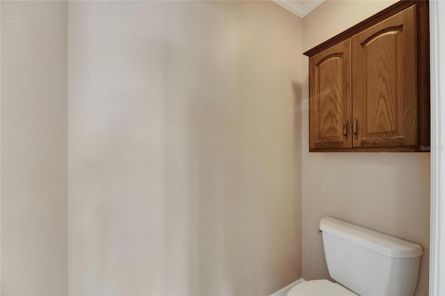 318 Lookout Dr, Apollo Beach, FL 33572 - bathroom featuring toilet and crown molding
