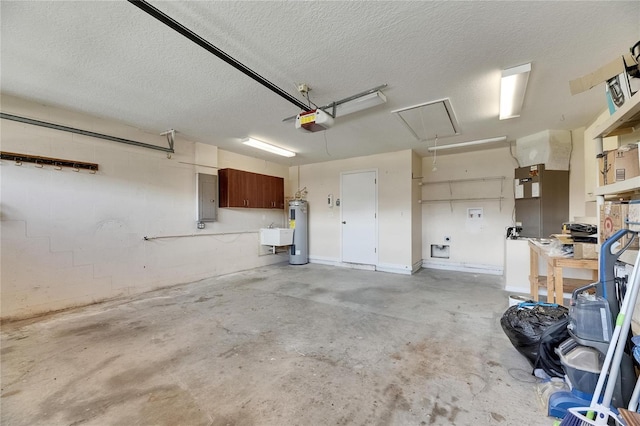 318 Lookout Dr, Apollo Beach, FL 33572 - garage featuring a garage door opener, electric panel, and water heater