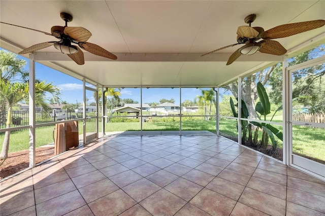 318 Lookout Dr, Apollo Beach, FL 33572 - unfurnished sunroom featuring a ceiling fan and a residential view