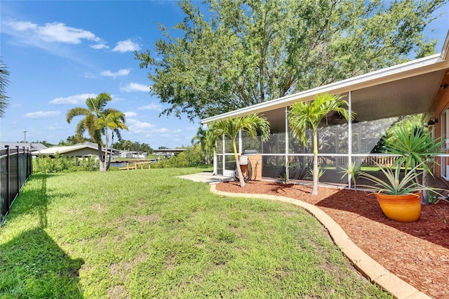 318 Lookout Dr, Apollo Beach, FL 33572 - view of yard with a sunroom