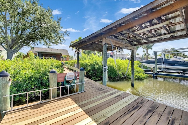 318 Lookout Dr, Apollo Beach, FL 33572 - dock area featuring boat lift and a water view