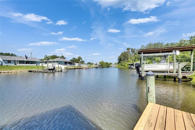 318 Lookout Dr, Apollo Beach, FL 33572 - dock with a water view and boat lift