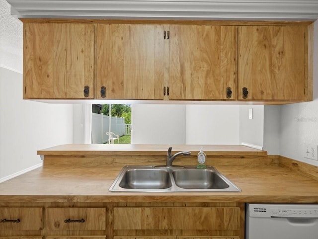 6114 Oak Cluster Cir, Tampa, FL 33634 - kitchen featuring white dishwasher and light countertops