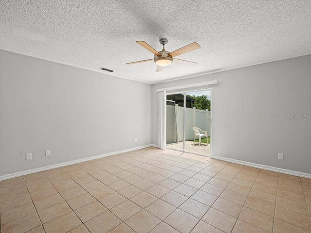 6114 Oak Cluster Cir, Tampa, FL 33634 - unfurnished room with a ceiling fan and a textured ceiling