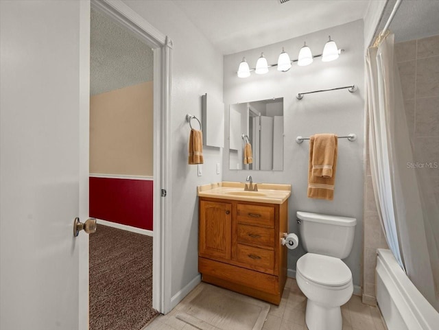 6114 Oak Cluster Cir, Tampa, FL 33634 - bathroom with vanity, shower / bath combo with shower curtain, and tile patterned flooring