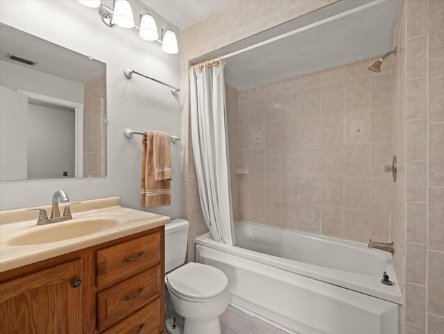 6114 Oak Cluster Cir, Tampa, FL 33634 - bathroom featuring shower / bath combo with shower curtain, vanity, and tile patterned flooring