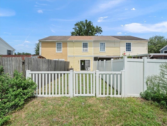 6114 Oak Cluster Cir, Tampa, FL 33634 - rear view of property with a fenced backyard