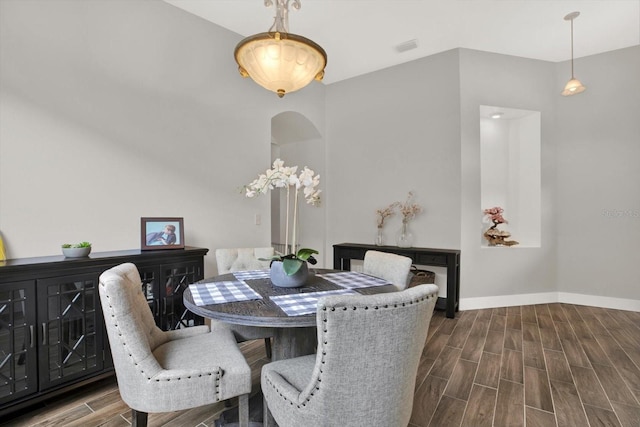4901 Windingbrook Trl, Wesley Chapel, FL 33544 - dining area featuring dark wood finished floors and baseboards
