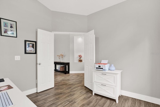 4901 Windingbrook Trl, Wesley Chapel, FL 33544 - home office featuring baseboards and wood finished floors
