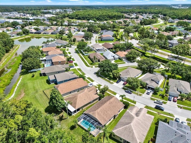 4901 Windingbrook Trl, Wesley Chapel, FL 33544 - aerial overview of property's location with nearby suburban area and a large body of water
