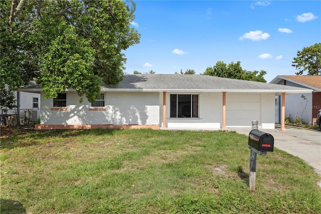 10730 Premier Ave, Port Richey, FL 34668 - ranch-style home with a garage, a front yard, concrete driveway, and roof with shingles