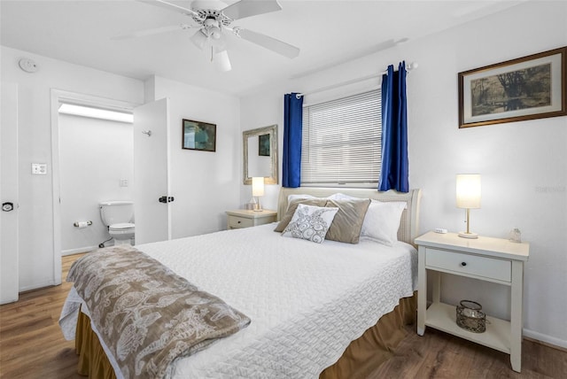12458 1st St W, Treasure Island, FL 33706 - bedroom with wood finished floors and ceiling fan