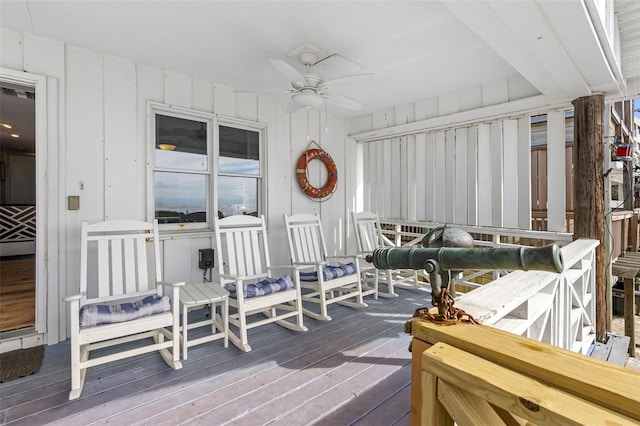 12458 1st St W, Treasure Island, FL 33706 - deck featuring ceiling fan