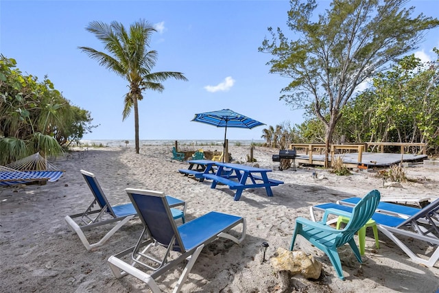 12458 1st St W, Treasure Island, FL 33706 - view of patio / terrace with area for grilling