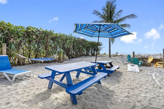 12458 1st St W, Treasure Island, FL 33706 - view of home's community with an outdoor fire pit