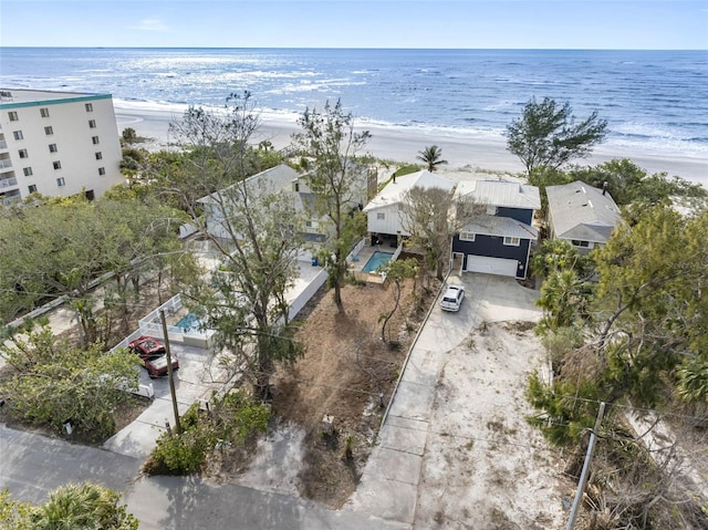 12458 1st St W, Treasure Island, FL 33706 - drone / aerial view of waterfront with a beach