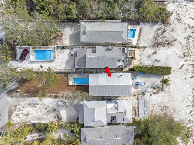 12458 1st St W, Treasure Island, FL 33706 - aerial view of property and surrounding area featuring a pool