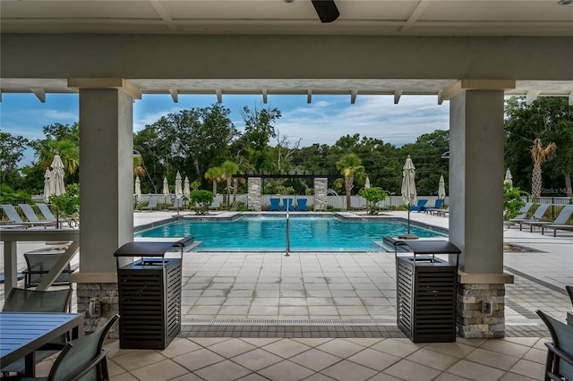 26082 Woven Wicker Bnd, Lutz, FL 33559 - community pool with a patio area and a ceiling fan