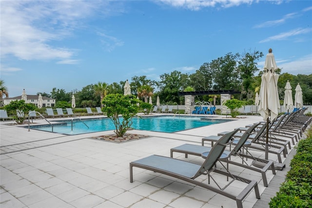 26082 Woven Wicker Bnd, Lutz, FL 33559 - community pool featuring a patio