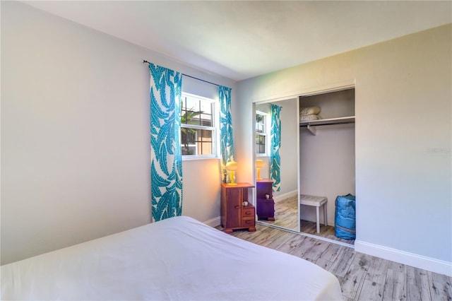 3910 14th Ave N, Saint Petersburg, FL 33713 - bedroom featuring light wood finished floors and a closet