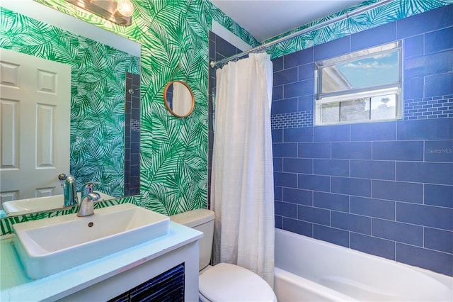 3910 14th Ave N, Saint Petersburg, FL 33713 - bathroom featuring wallpapered walls, shower / bath combo, and vanity