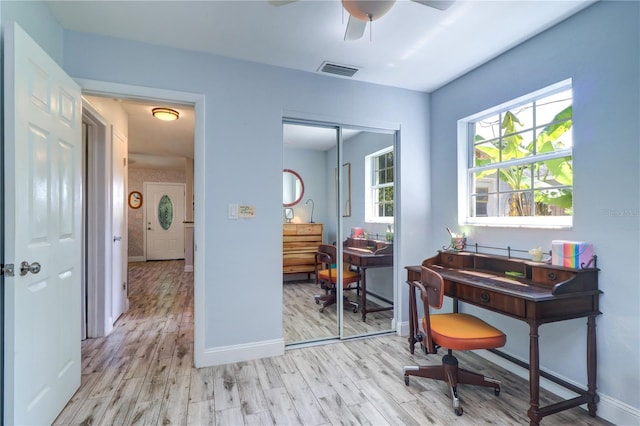 3910 14th Ave N, Saint Petersburg, FL 33713 - home office featuring light wood finished floors and a ceiling fan