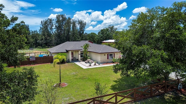 408 River Bed Ct, Wimauma, FL 33598 - view of front of property featuring stucco siding