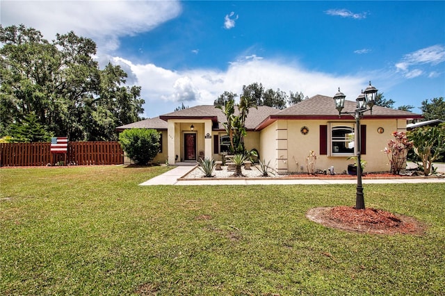 408 River Bed Ct, Wimauma, FL 33598 - view of front of home with stucco siding