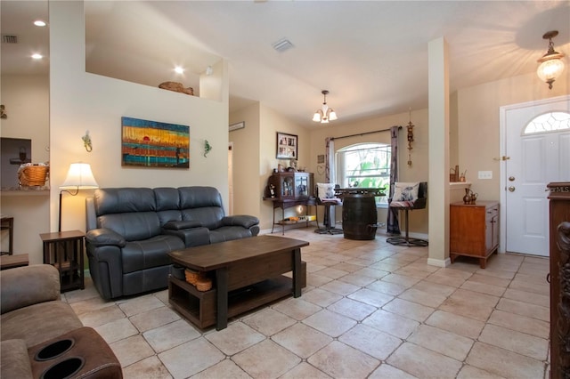 408 River Bed Ct, Wimauma, FL 33598 - living room with a chandelier and lofted ceiling