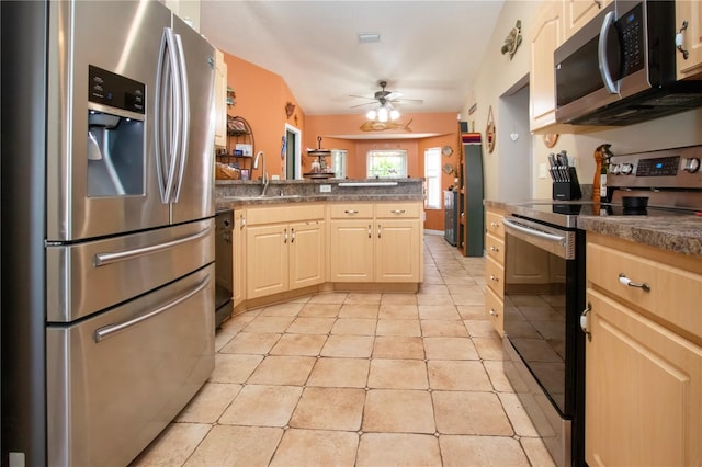 408 River Bed Ct, Wimauma, FL 33598 - kitchen featuring appliances with stainless steel finishes, a peninsula, ceiling fan, and light brown cabinets