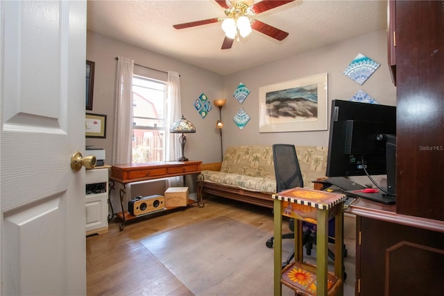 408 River Bed Ct, Wimauma, FL 33598 - office with wood finished floors and a ceiling fan