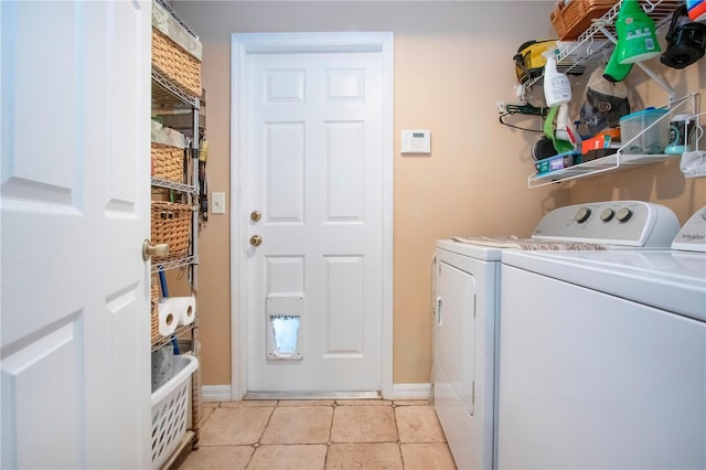 408 River Bed Ct, Wimauma, FL 33598 - washroom featuring washer and clothes dryer and light tile patterned floors