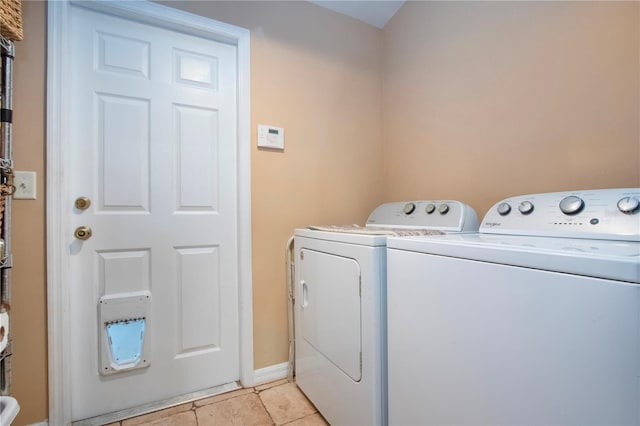 408 River Bed Ct, Wimauma, FL 33598 - laundry area with washer and dryer and light tile patterned flooring