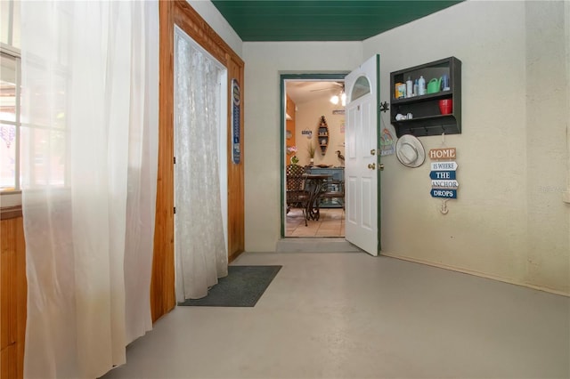 408 River Bed Ct, Wimauma, FL 33598 - hall with finished concrete flooring