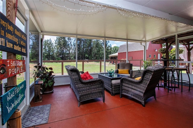 408 River Bed Ct, Wimauma, FL 33598 - sunroom / solarium featuring an outdoor hangout area