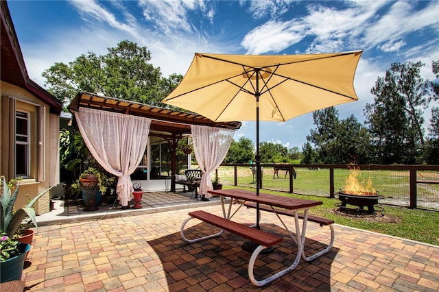 408 River Bed Ct, Wimauma, FL 33598 - view of patio featuring a fire pit