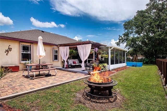 408 River Bed Ct, Wimauma, FL 33598 - view of yard with an outdoor fire pit, a sunroom, a patio area, and a pergola