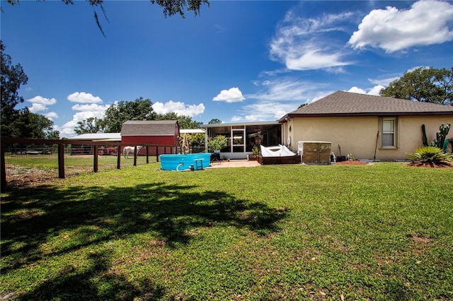 408 River Bed Ct, Wimauma, FL 33598 - view of yard with a sunroom