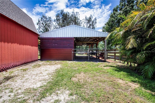 408 River Bed Ct, Wimauma, FL 33598 - view of yard with an outdoor structure and an exterior structure