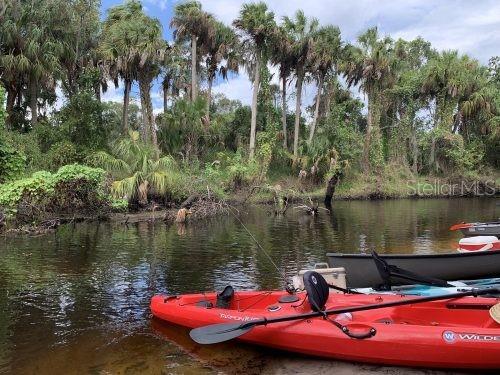 408 River Bed Ct, Wimauma, FL 33598 - dock area featuring a water view