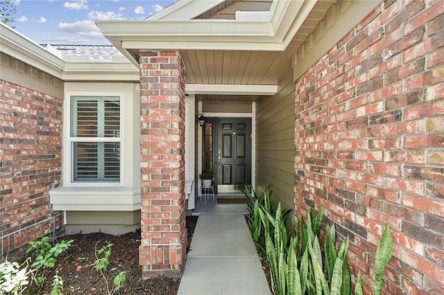 344 Cascade Ln, Palm Harbor, FL 34684 - view of exterior entry with brick siding