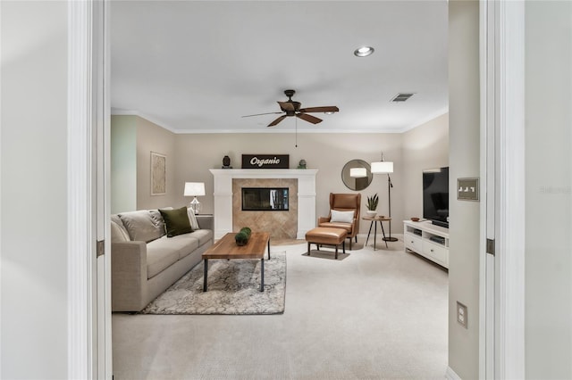 344 Cascade Ln, Palm Harbor, FL 34684 - carpeted living area featuring ceiling fan, crown molding, a premium fireplace, and recessed lighting