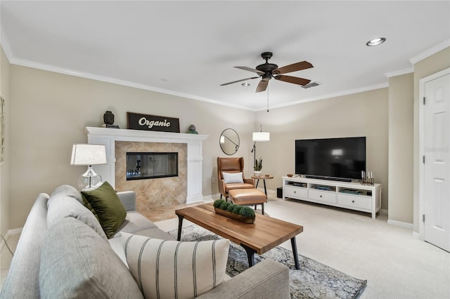 344 Cascade Ln, Palm Harbor, FL 34684 - living area with a ceiling fan, ornamental molding, a fireplace, carpet floors, and recessed lighting