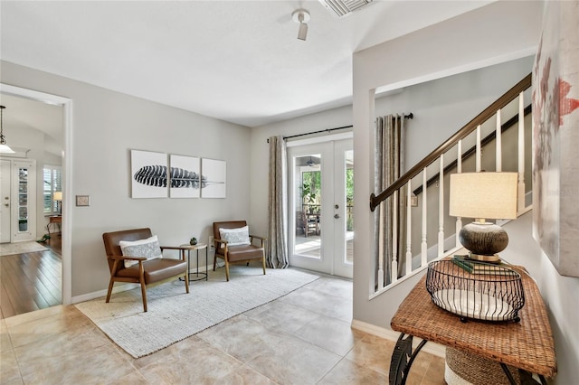 344 Cascade Ln, Palm Harbor, FL 34684 - foyer entrance with healthy amount of natural light, french doors, and stairs